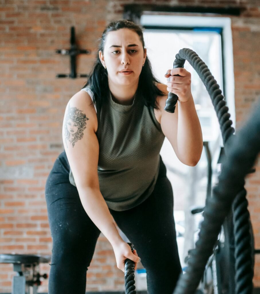 Women exercising in gyms often face barriers, including body image issues and harassment