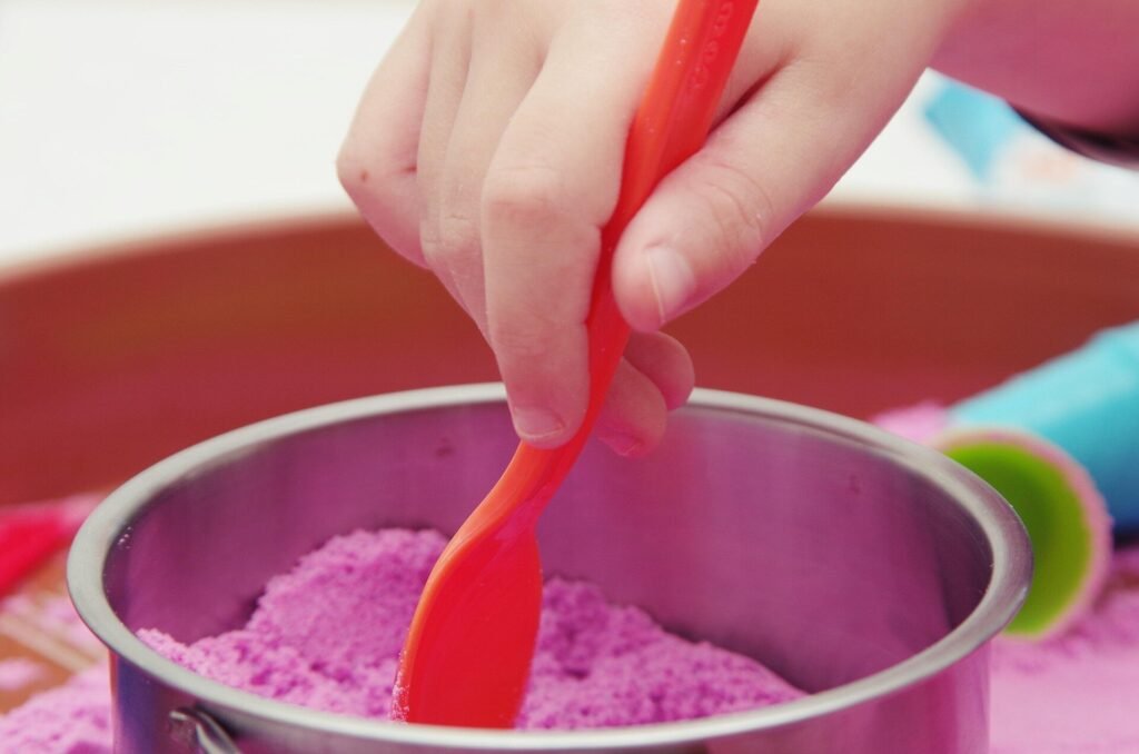 Asbestos has been found in children’s colored sand. What’s the risk to kids?